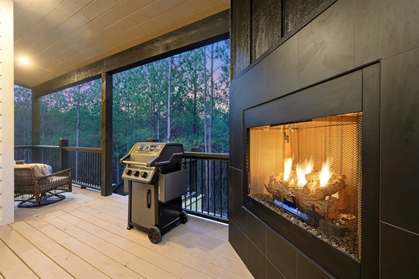 Evenings made easy—fireplace glow, private hot tub, and peaceful woods.