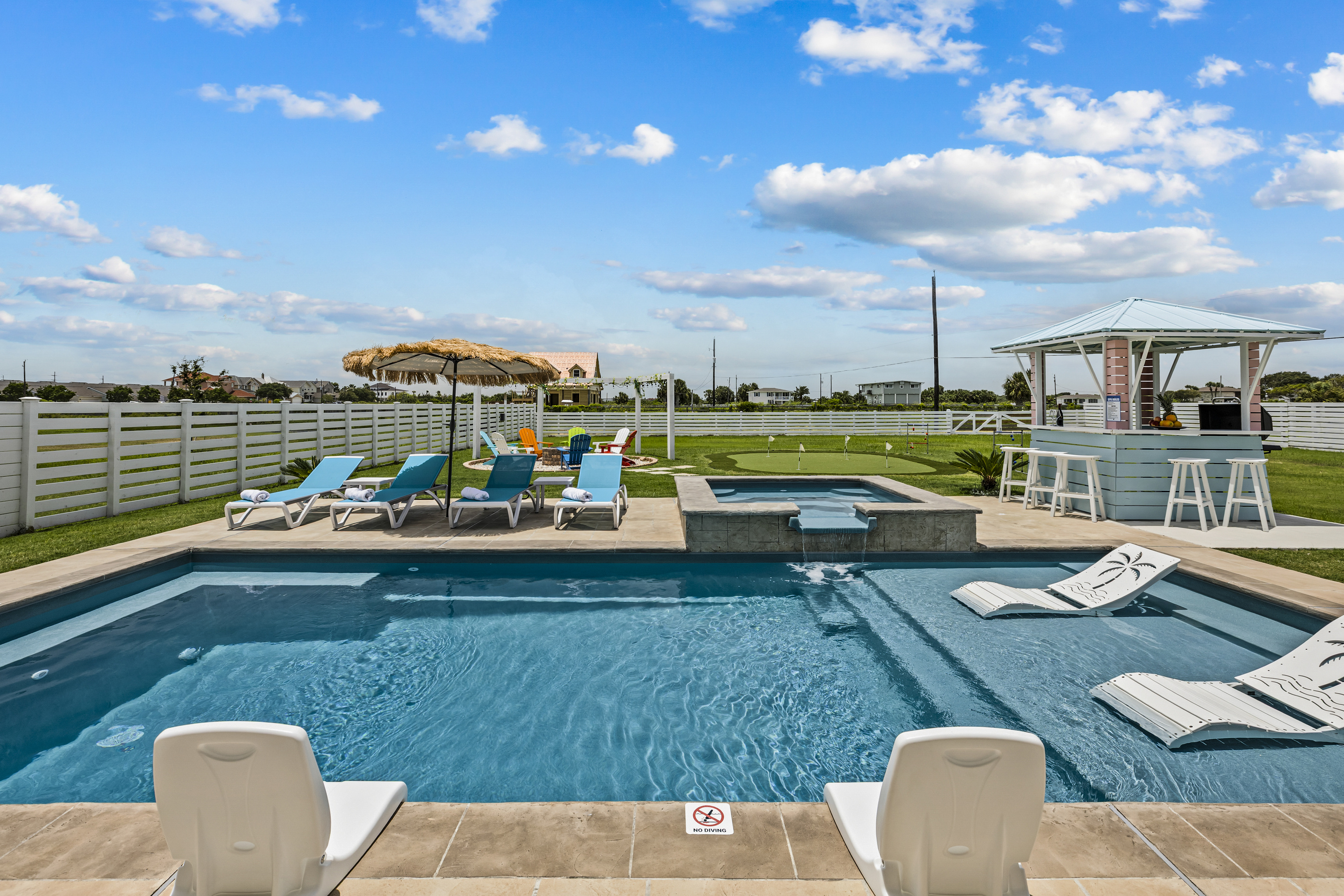Resort-Style Pool & Spa
Spend your days relaxing by the sparkling private pool and heated spa. Stretch out on comfortable chaise lounges, unwind under shaded umbrellas, or soak up the Texas sunshine in this beautifully designed backyard oasis.