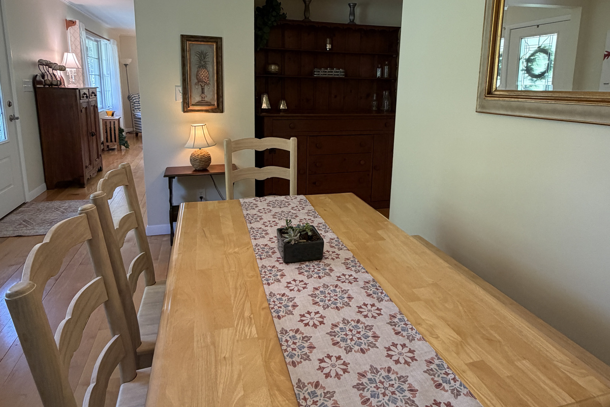 Dining room with living room beyond