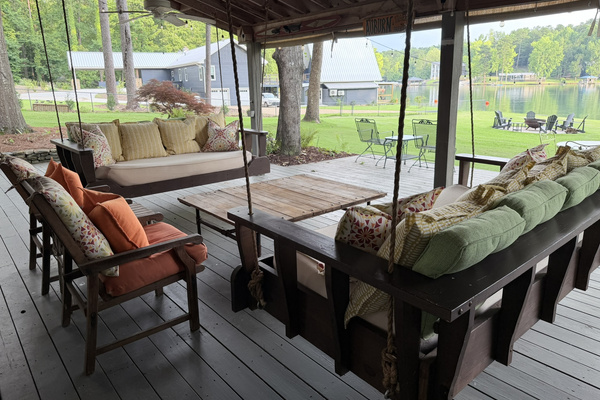 Wonderful covered porch area with 2 swing beds