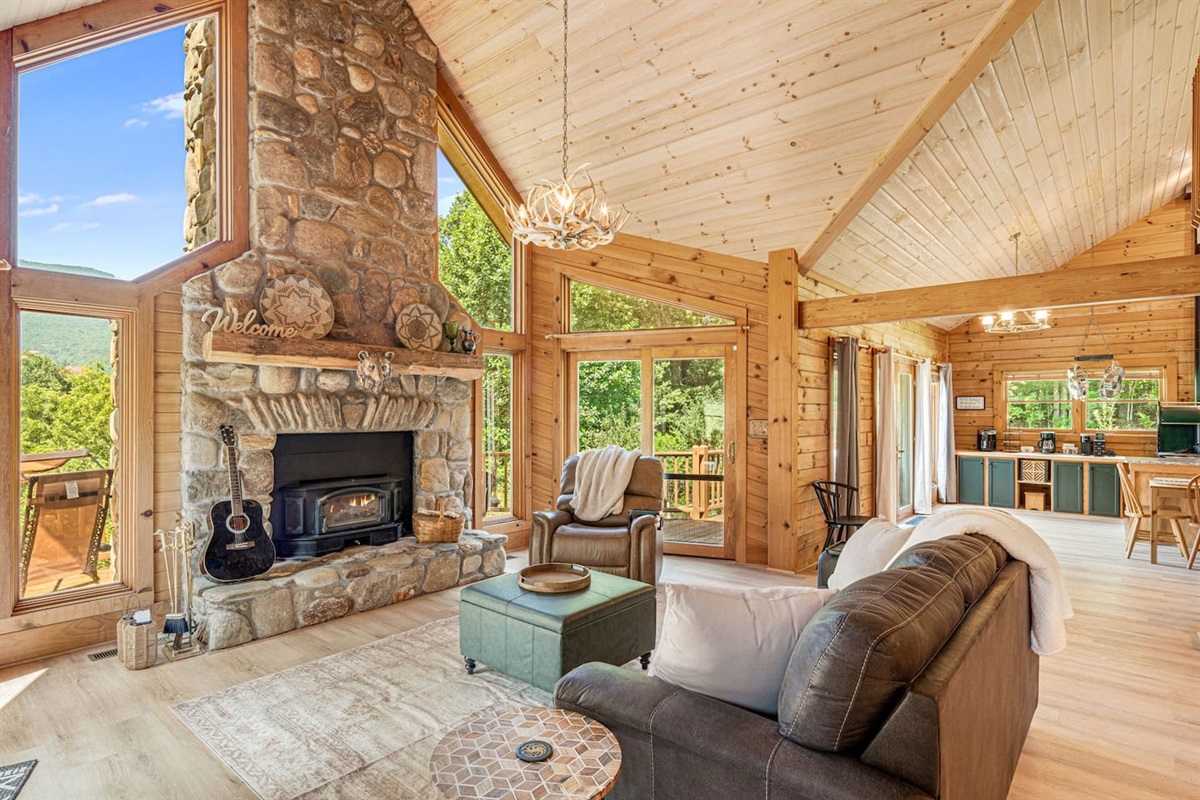Surrounded by the beauty of the mountains, this living space blends rustic elegance with modern comfort. Whether you're curling up with a good book, sharing stories by the fire, or simply gazing at the view, every moment here feels like home.