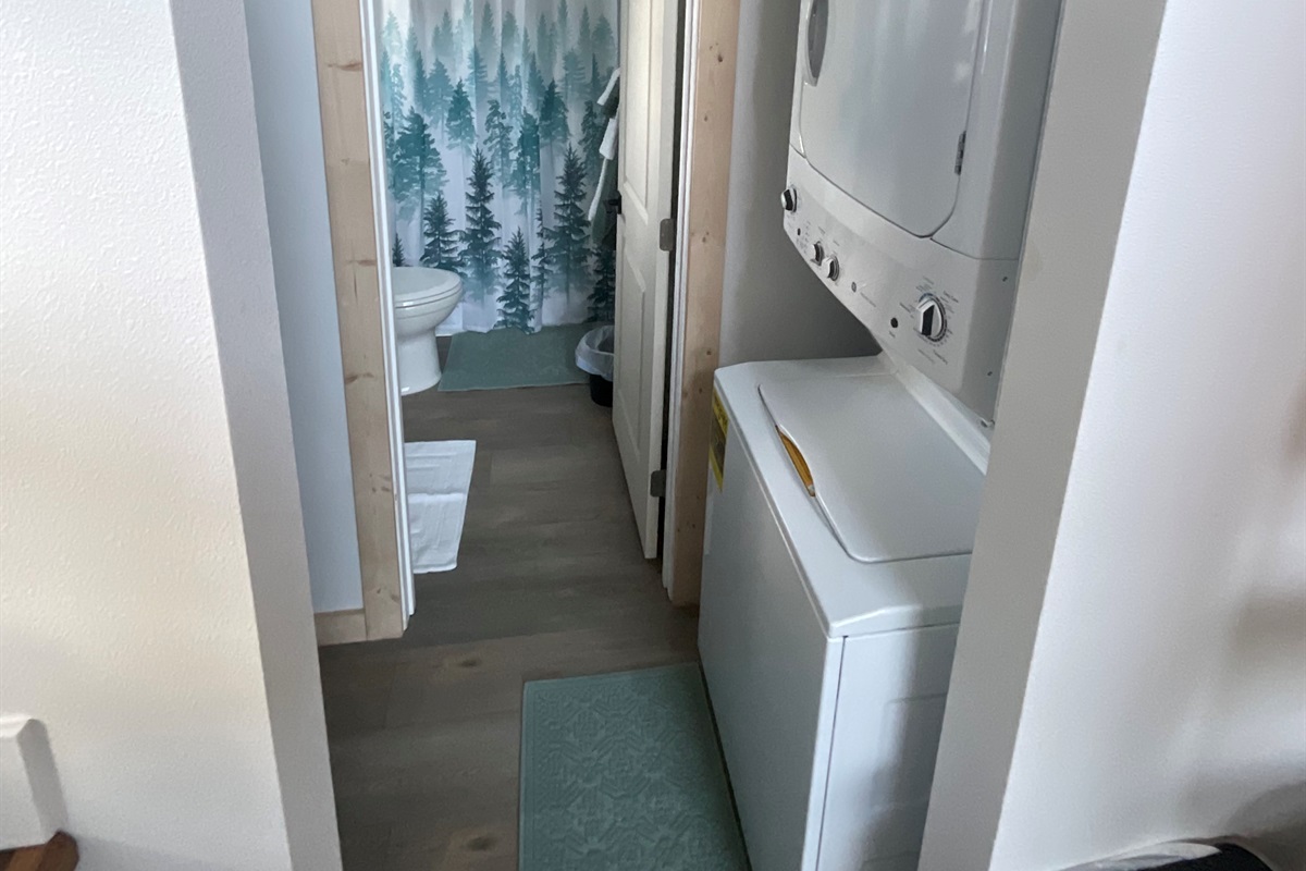 Washer/Dryer located just outside of the bathroom door.