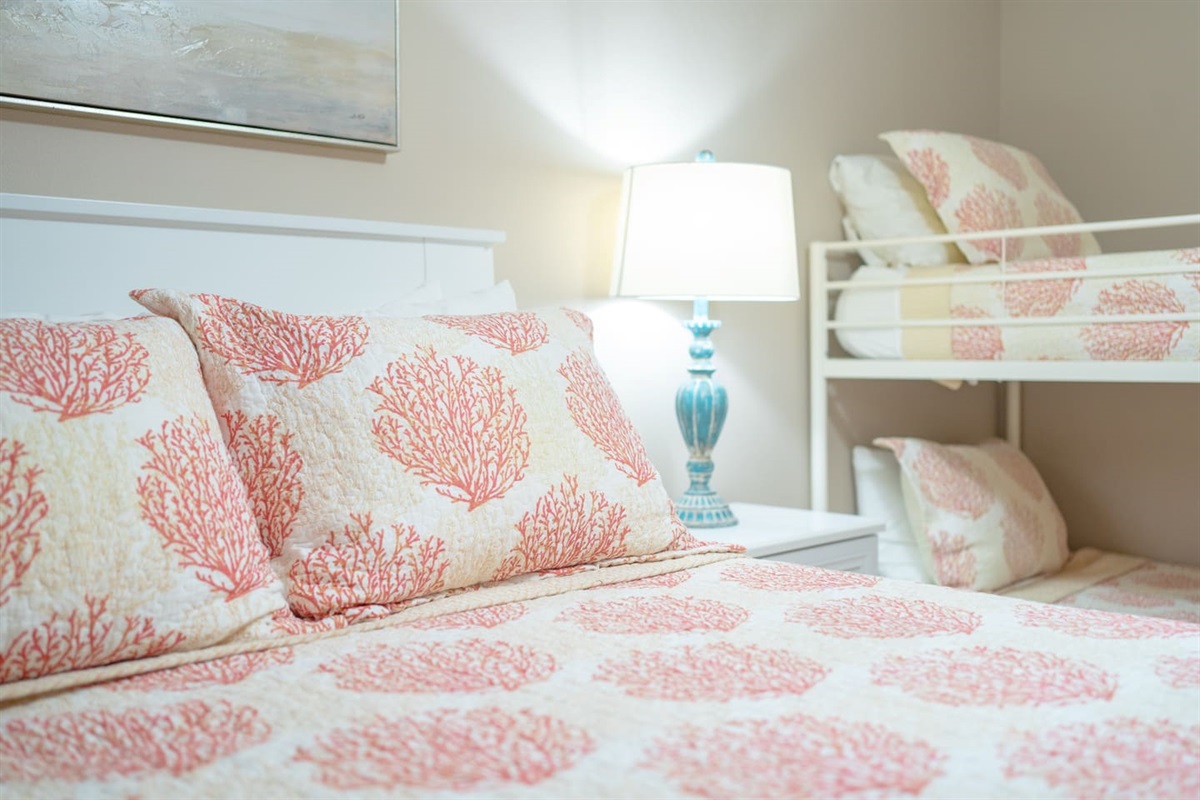 Bedroom 2 with Queen Bed and Twin Bunks. 