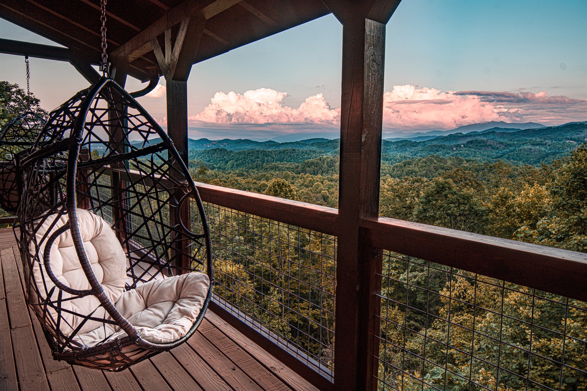 Welcome to The Heartbreaker! Relax and take in unbelievable views from our cozy swing chairs on the main level deck with sweeping views of Mt. LeConte and GSMNP.