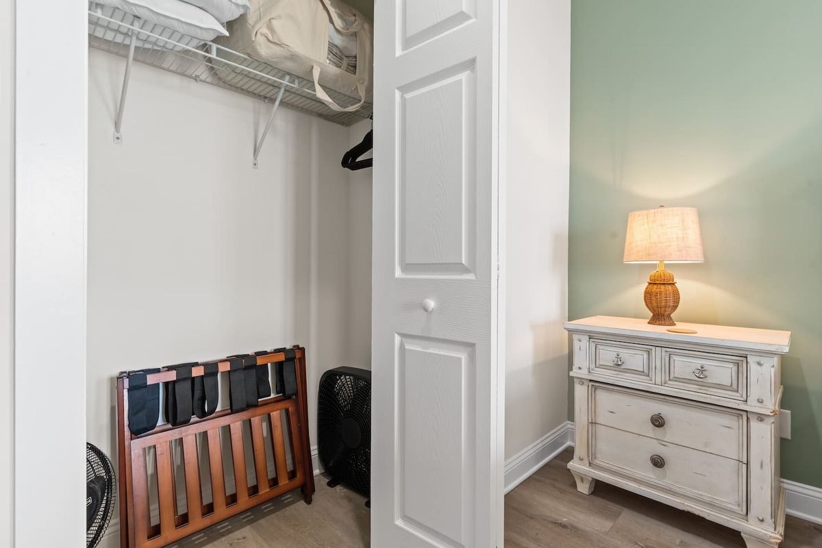 Luggage racks, hangers, fans, & linens for sofa bed provided. 