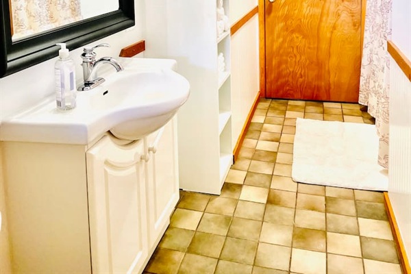 Bright bathroom with plenty of space and natural light.