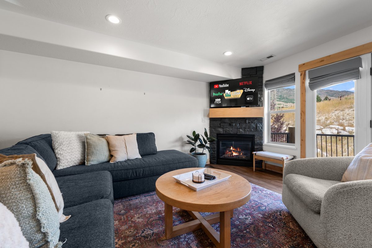 Gather comfortably in the welcoming living room, designed for easy conversation and downtime together.