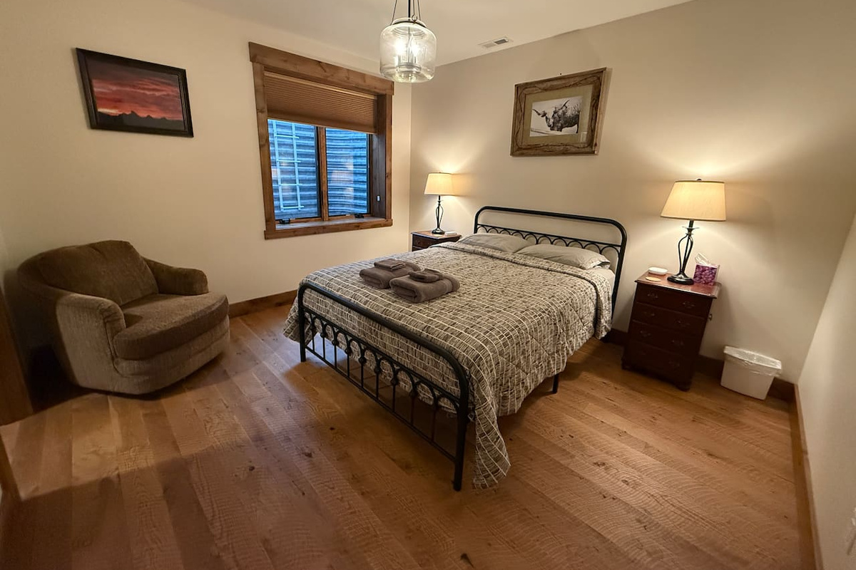 basement bedroom with queen bed