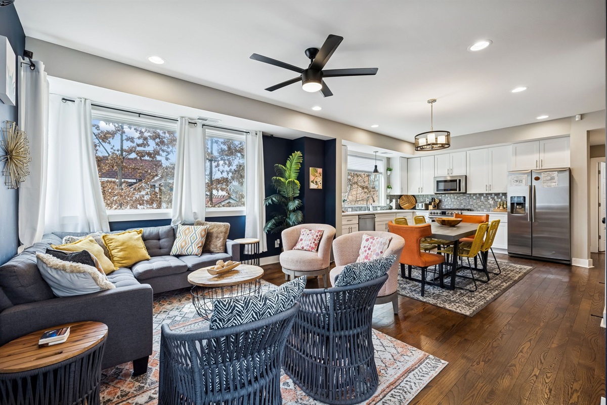 - Kick back in this bold, artful lounge with cozy textures & eye catching decor - Sunlight pours through wraparound windows, filling the space with warmth - Perfect for game nights, lazy mornings, or vibing with your favorite playlist