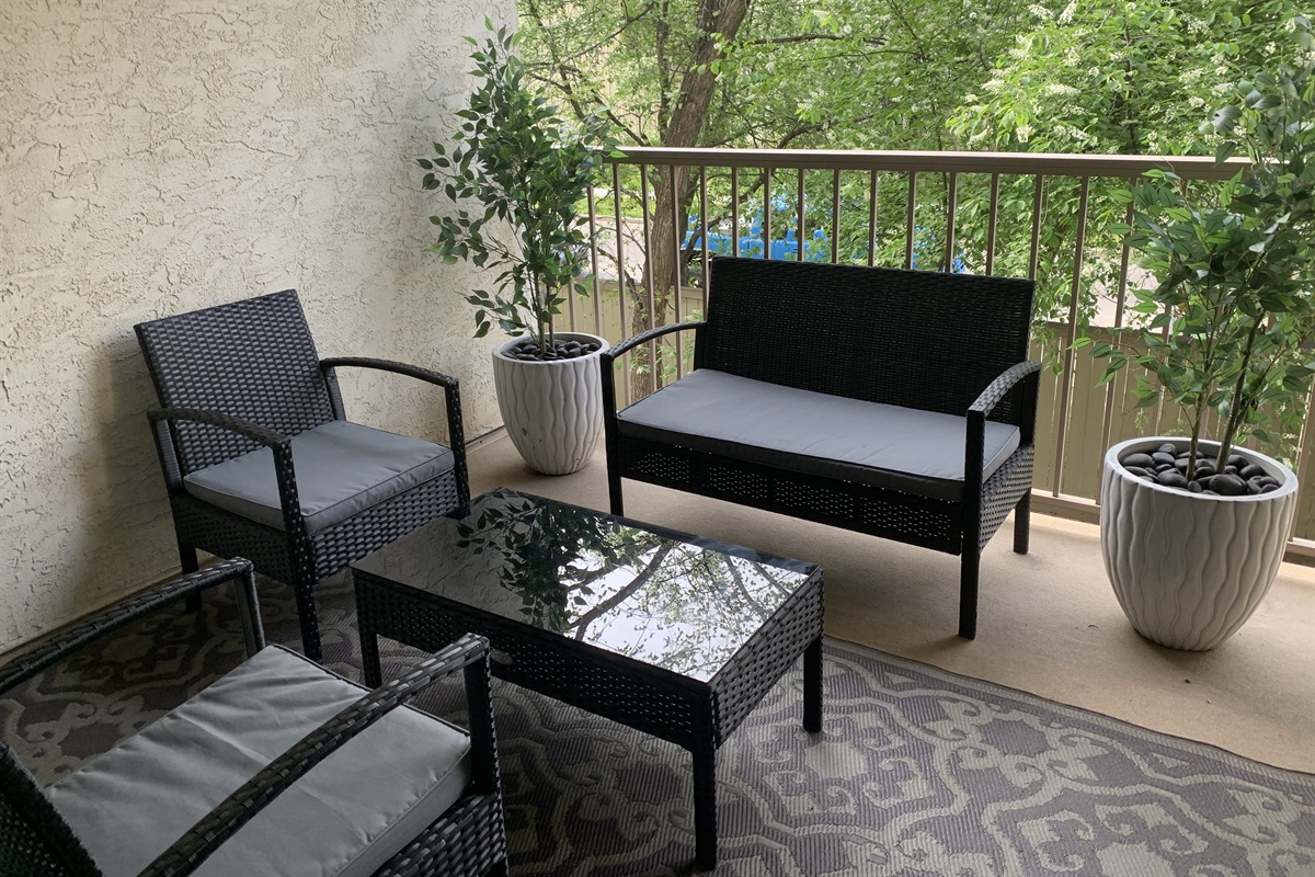 Covered patio with lots of seating.