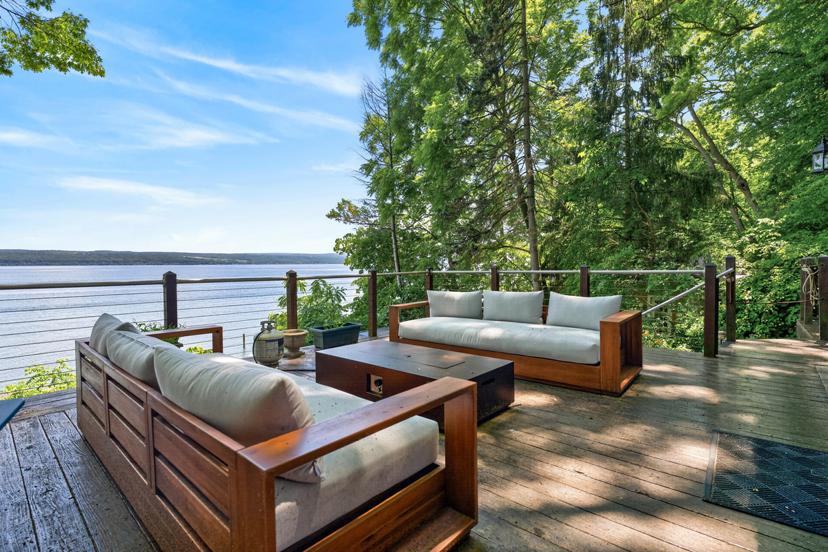 Outdoor lounge seating beside the water