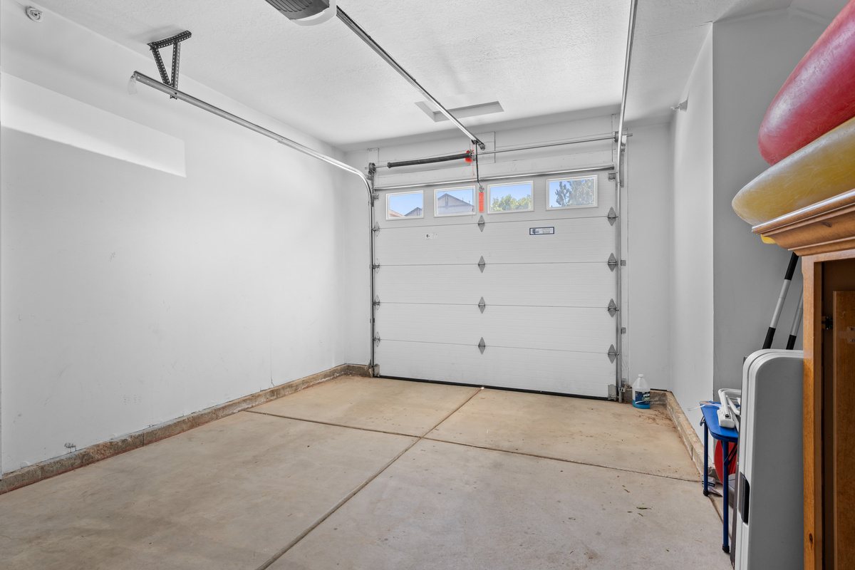 Spacious garage offers room for vehicles, bikes, skis, paddleboards, and adventure equipment.