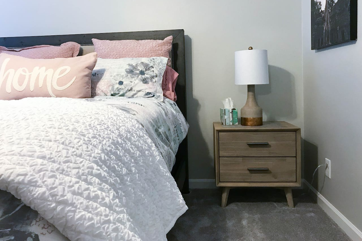 Guest room #1 furnished with night stand and dresser