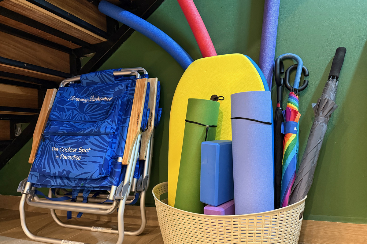 Beach chairs, boogie board, pool noodles, yoga mat, umbrellas. Grab and go.