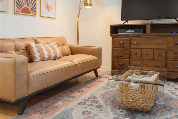 Big TV, comfy sitting areas in living room