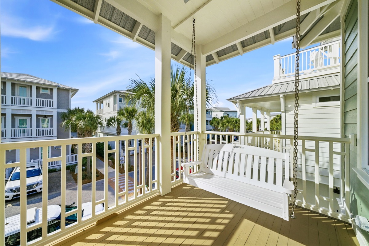 Step out and breathe in the fresh coastal air—private balcony access makes this bedroom a true sanctuary.