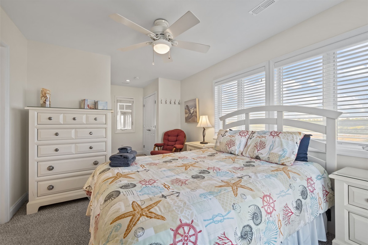 Spacious 2nd floor bedroom #2 with natural light and seating area