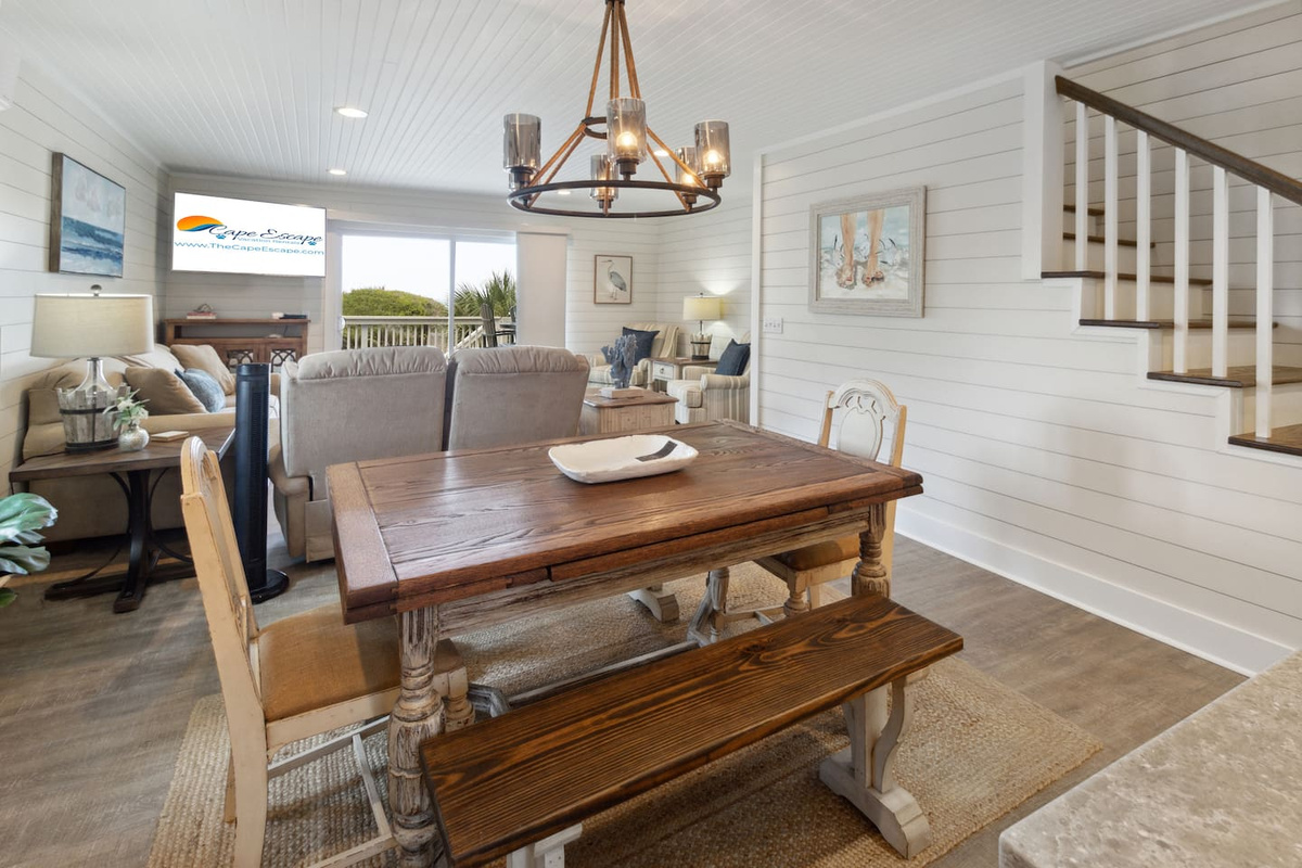  Everyone gathers around the dining table &mdash; island bar seating plus a full dining table means no one eats in shifts.