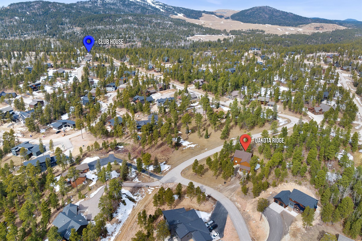 View of home in comparison to community pool