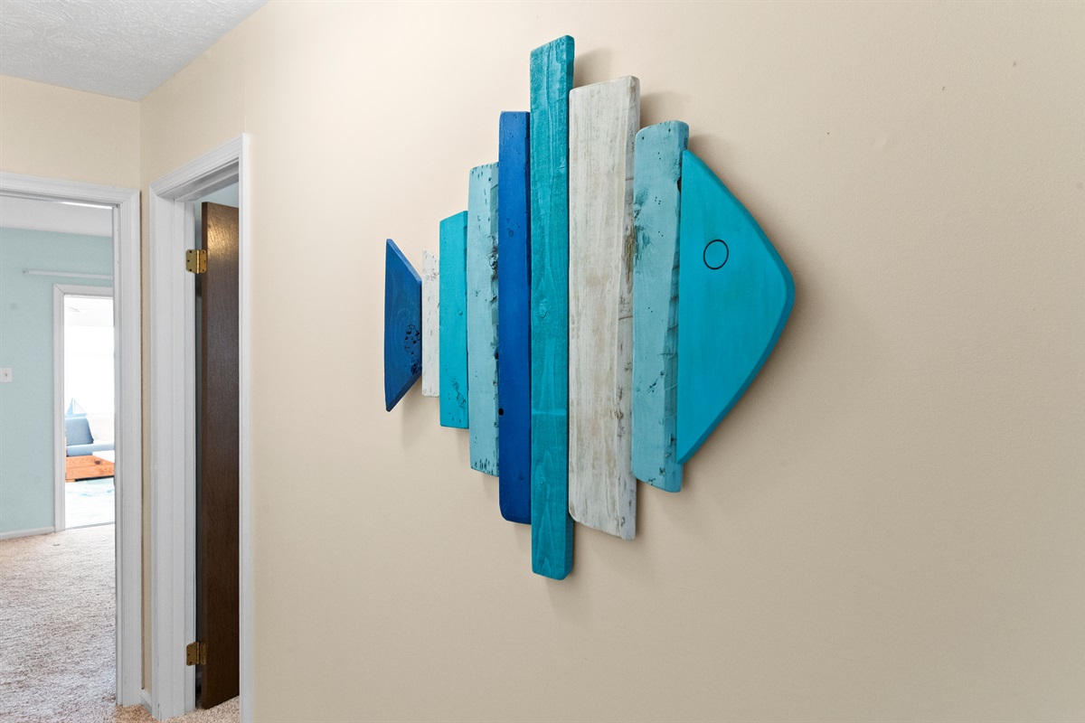 Artistic Touch: Dive into the vibrant aquatic vibe with this unique fish decor!