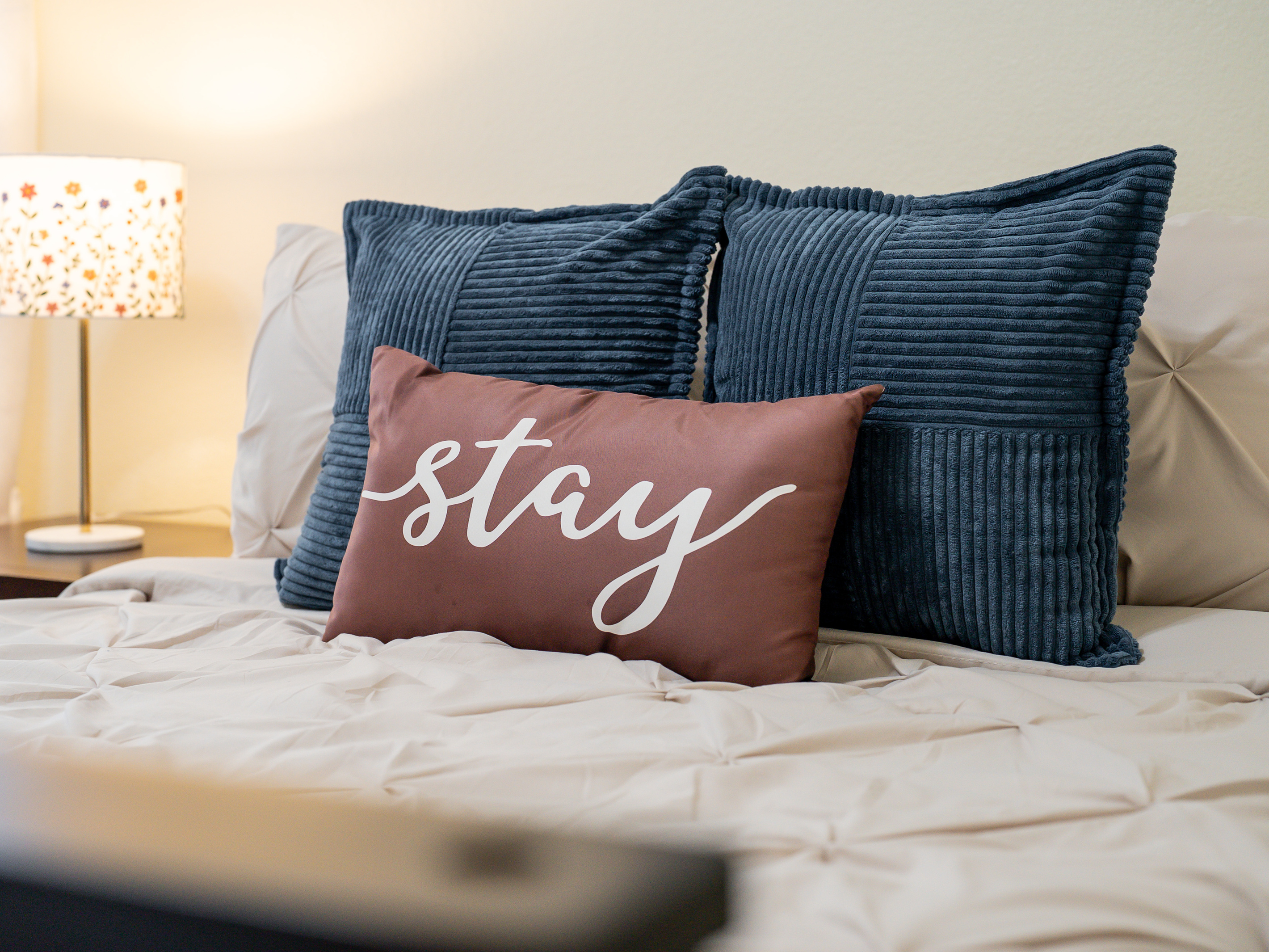 Soft linens, comfortable bedding, and a peaceful atmosphere create the perfect place for a restful night's sleep.