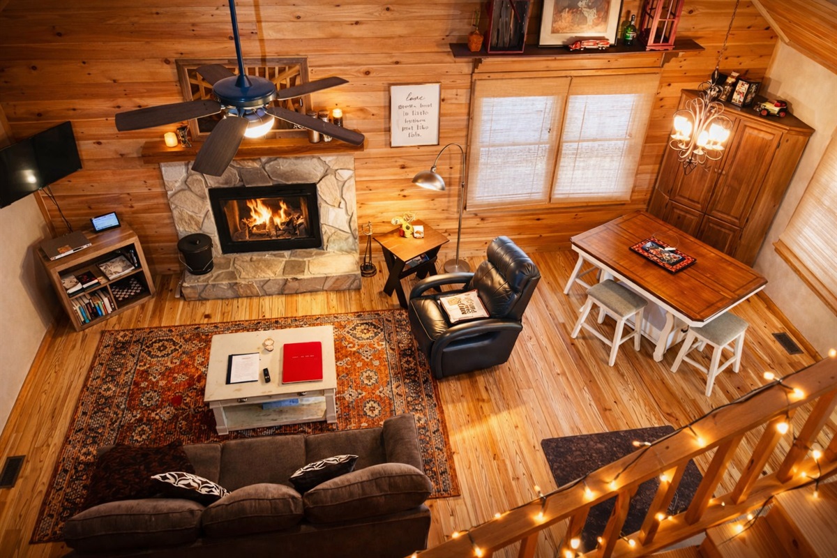 Cozy cabin living at its finest 🔥 Gather by the stone fireplace, relax in the warm wood interior, and enjoy the perfect mountain retreat.