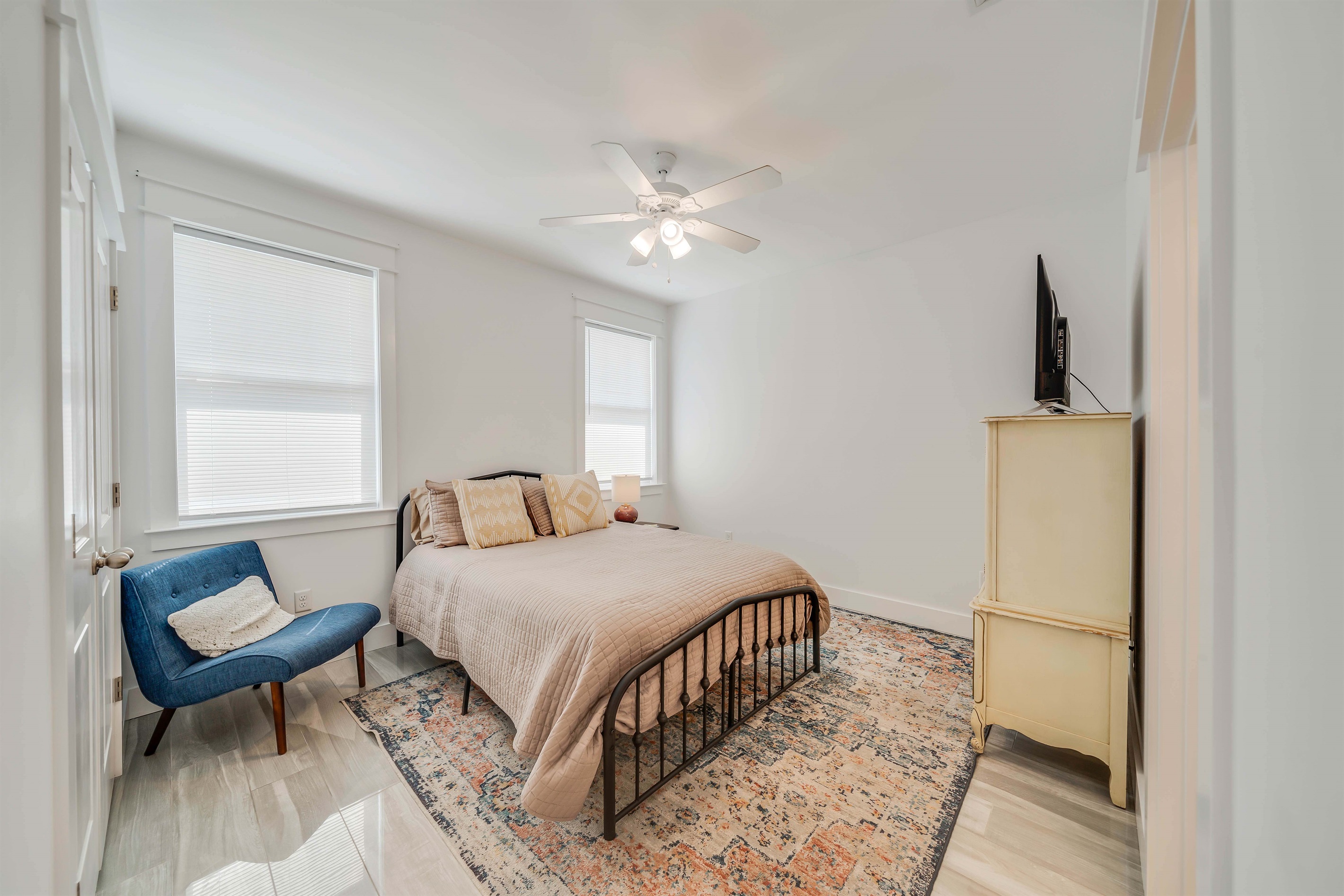 Unwind in this quiet queen bedroom after a busy day. You will love the privacy of the attached bathroom.
