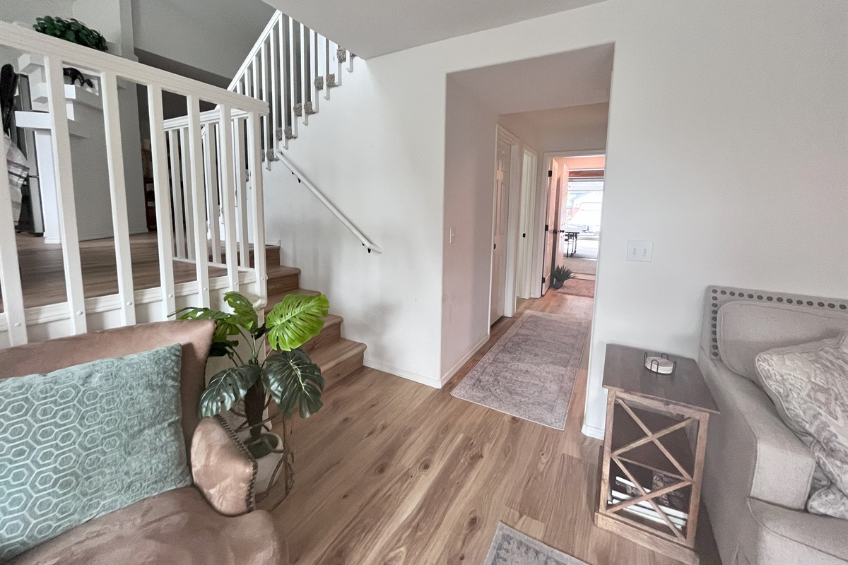enrty from garage brings you to family room and then a few steps up to kitchen level.
