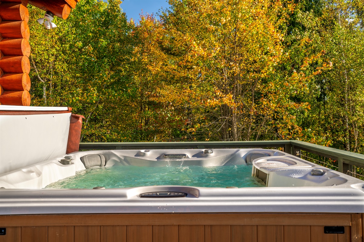 Soak and relax in your private hot tub after a day of adventure.