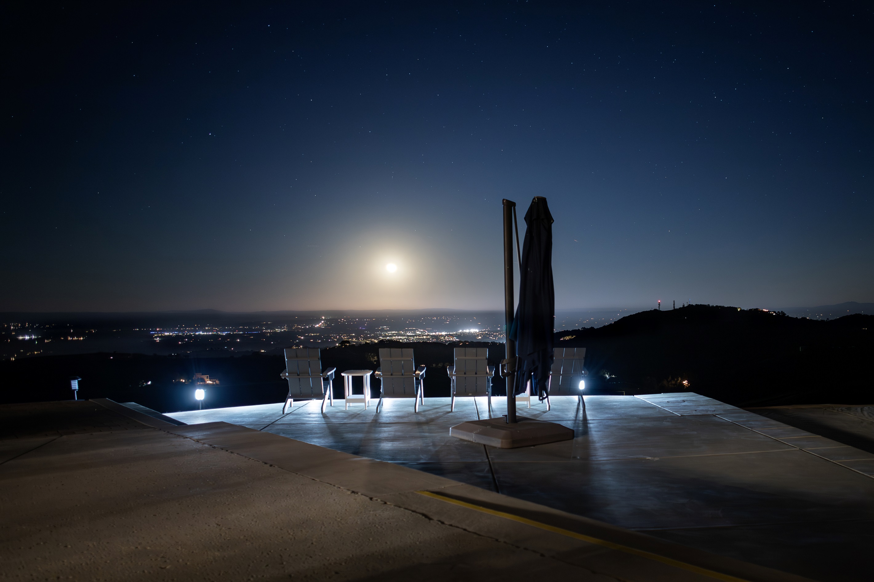 On a clear night at the Hilltop Guest House, the entire valley lights up below you and the moon rises over the Pacific. This view doesn't need a filter — or a caption.