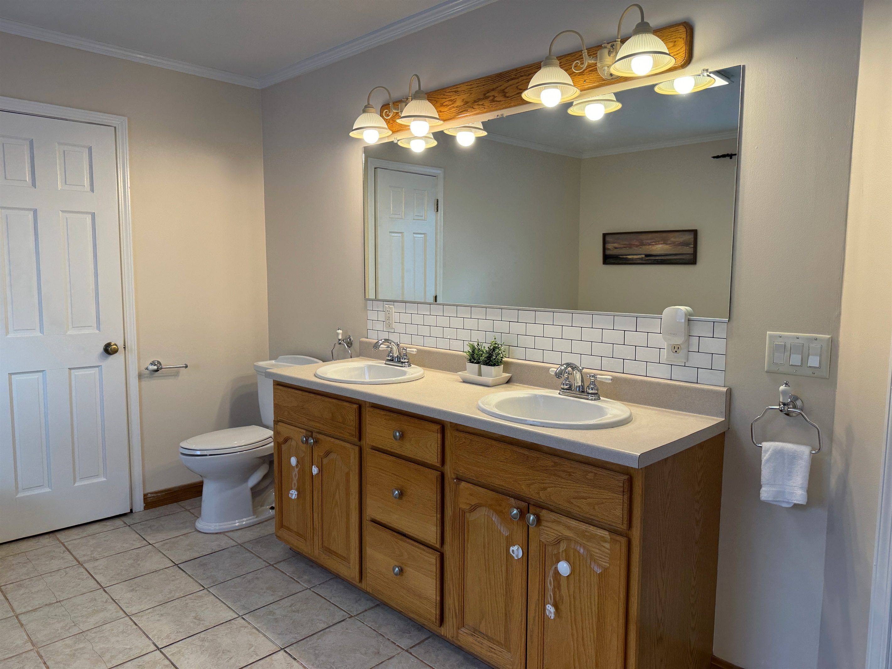 King primary ensuite bath with jetted tub and shower