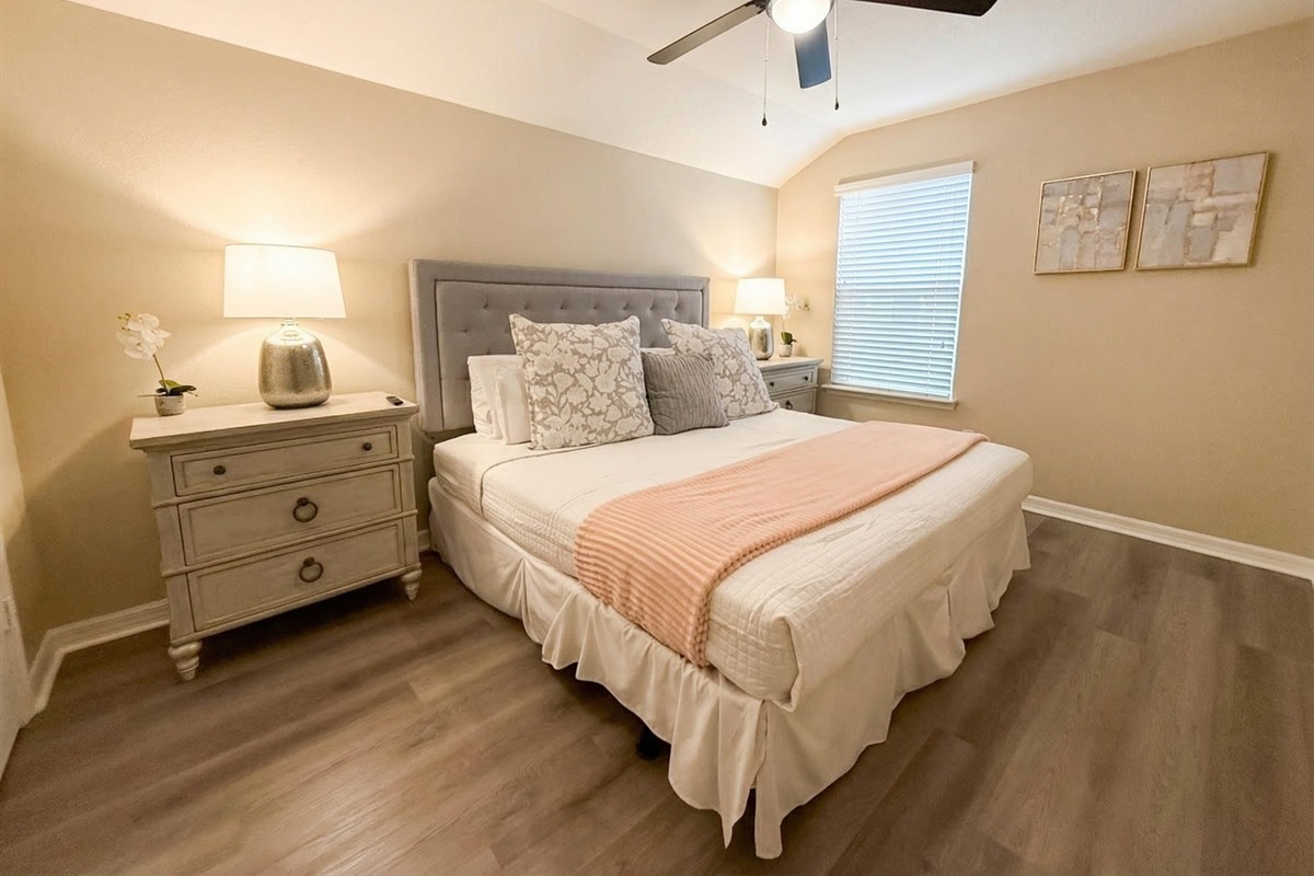 Elegant bedroom with modern furnishings and peaceful ambiance.