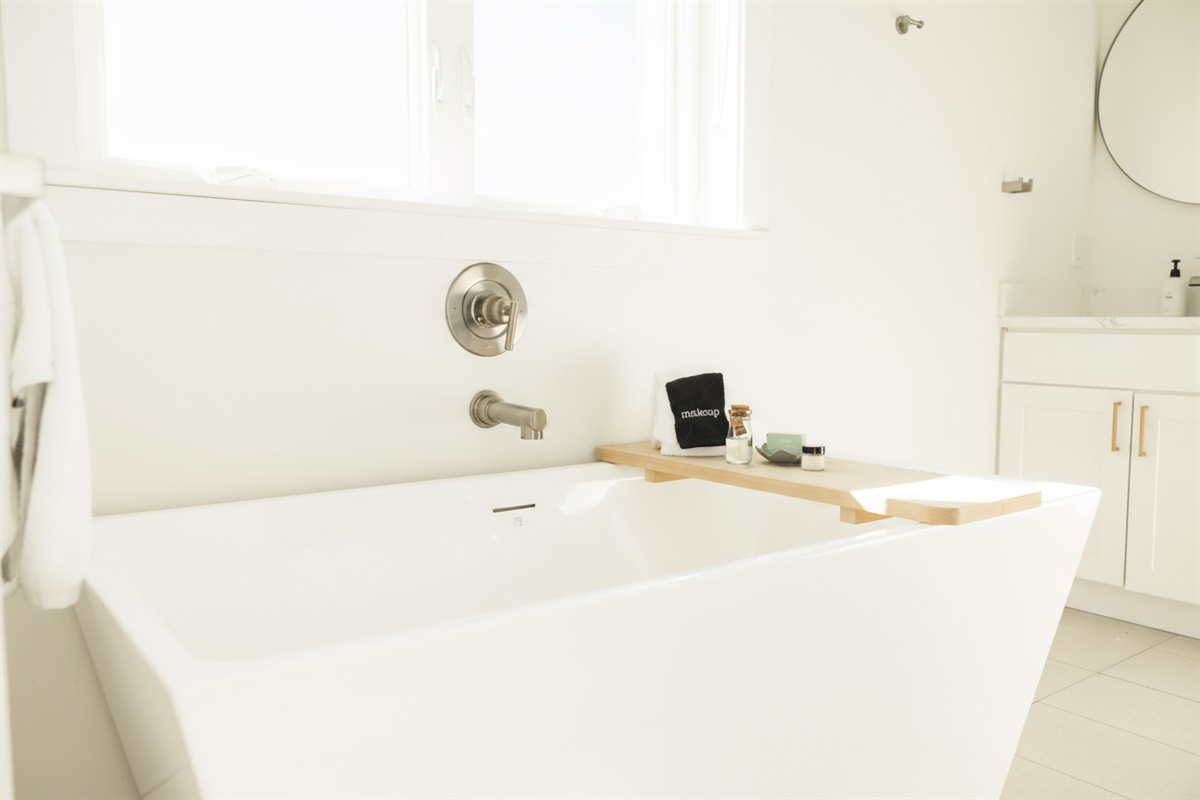 {Master Bath} Relax and recharge in the luxurious soaking tub with spa-inspired details.