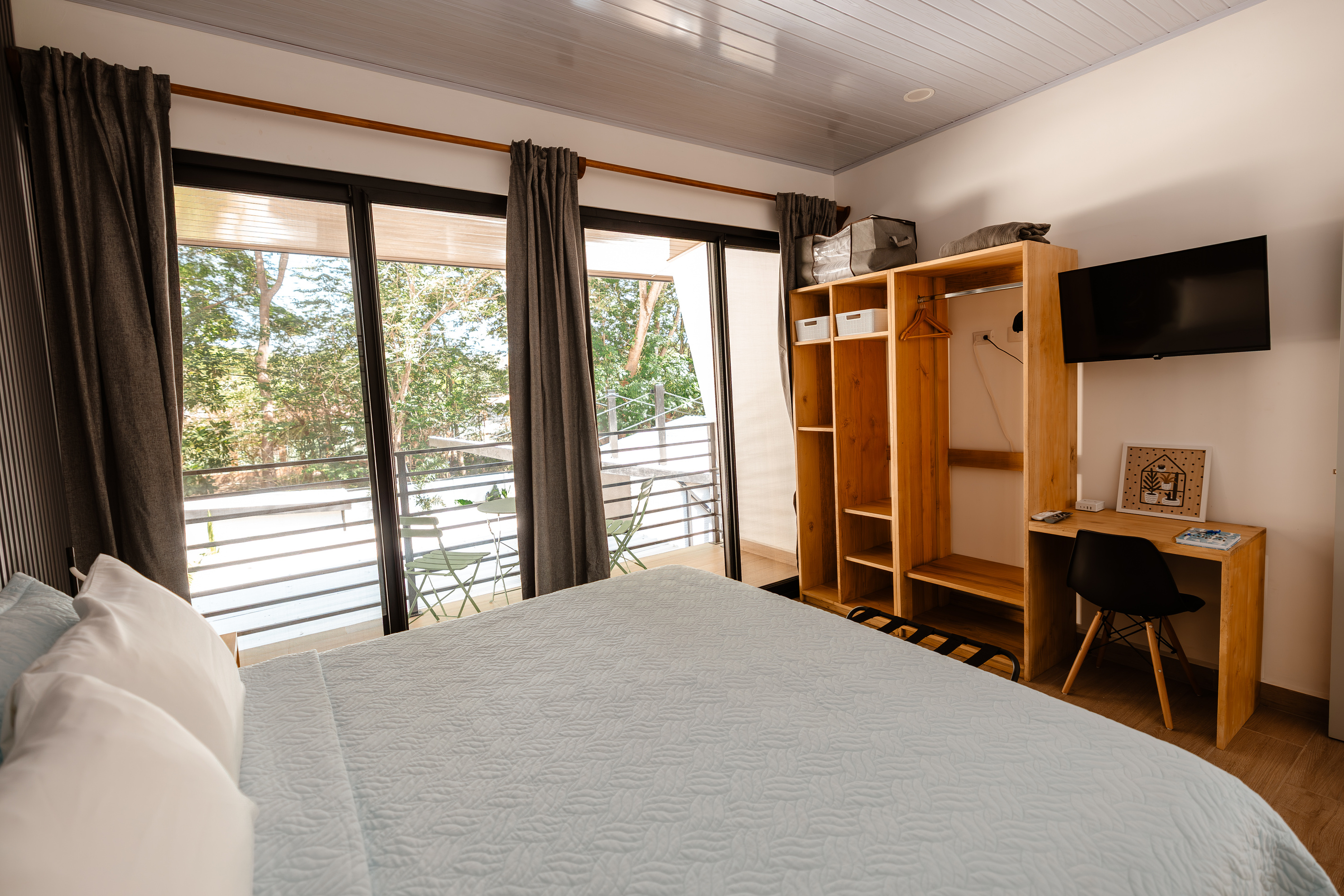 Full closet, smart TV, built-in workspace.