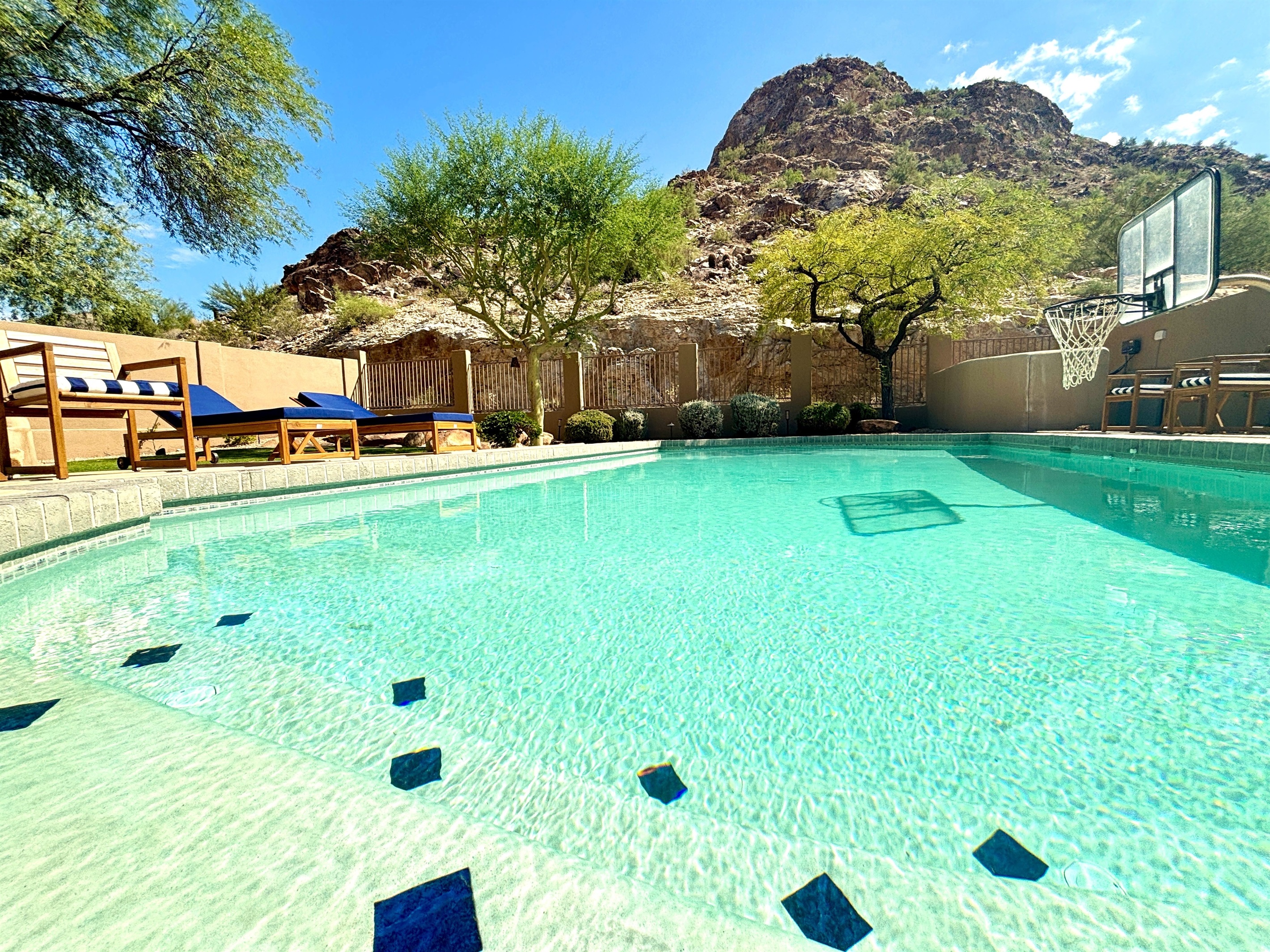 Backyard with private heated saltwater pool and plenty of seating