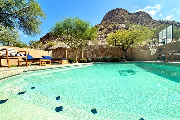 Backyard with private heated saltwater pool and plenty of seating