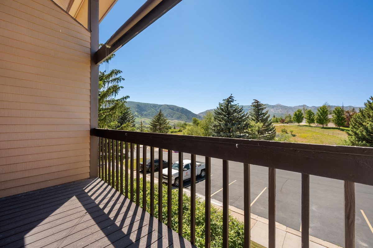 Private balcony with mountain views, the perfect place to enjoy your morning coffee or evening sunset.