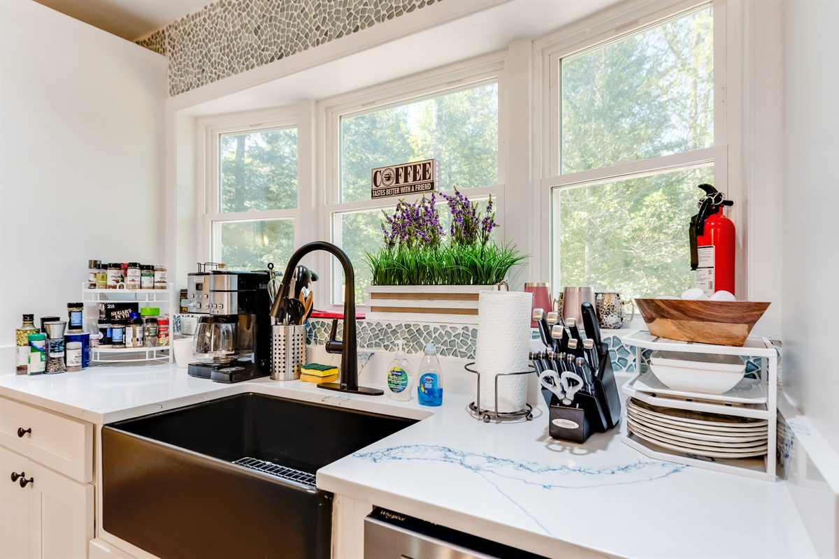 Fully Stocked Kitchen: Enjoy culinary adventures with gleaming quartz counters and serene views!