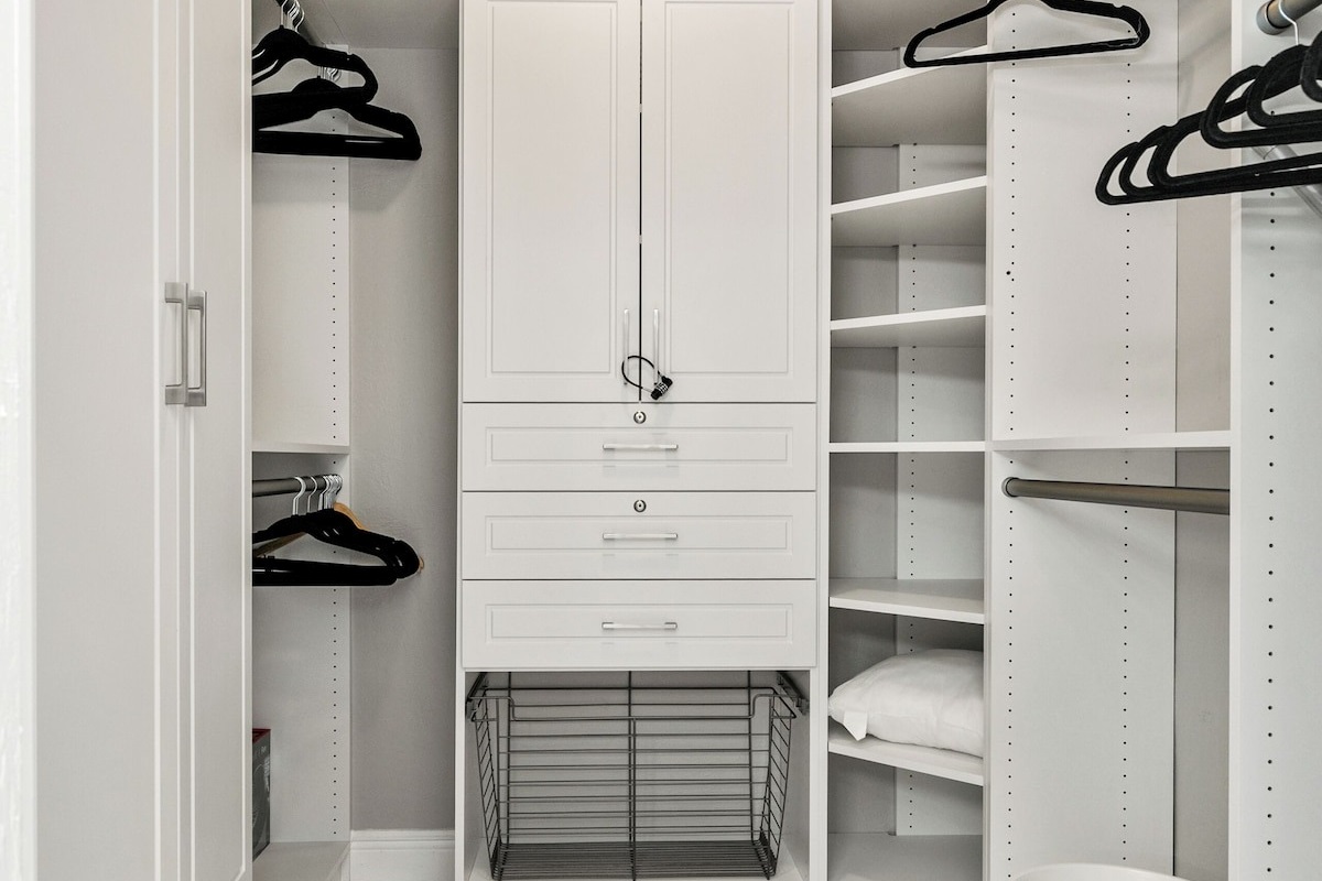 The master suite features a spacious walk-in closet