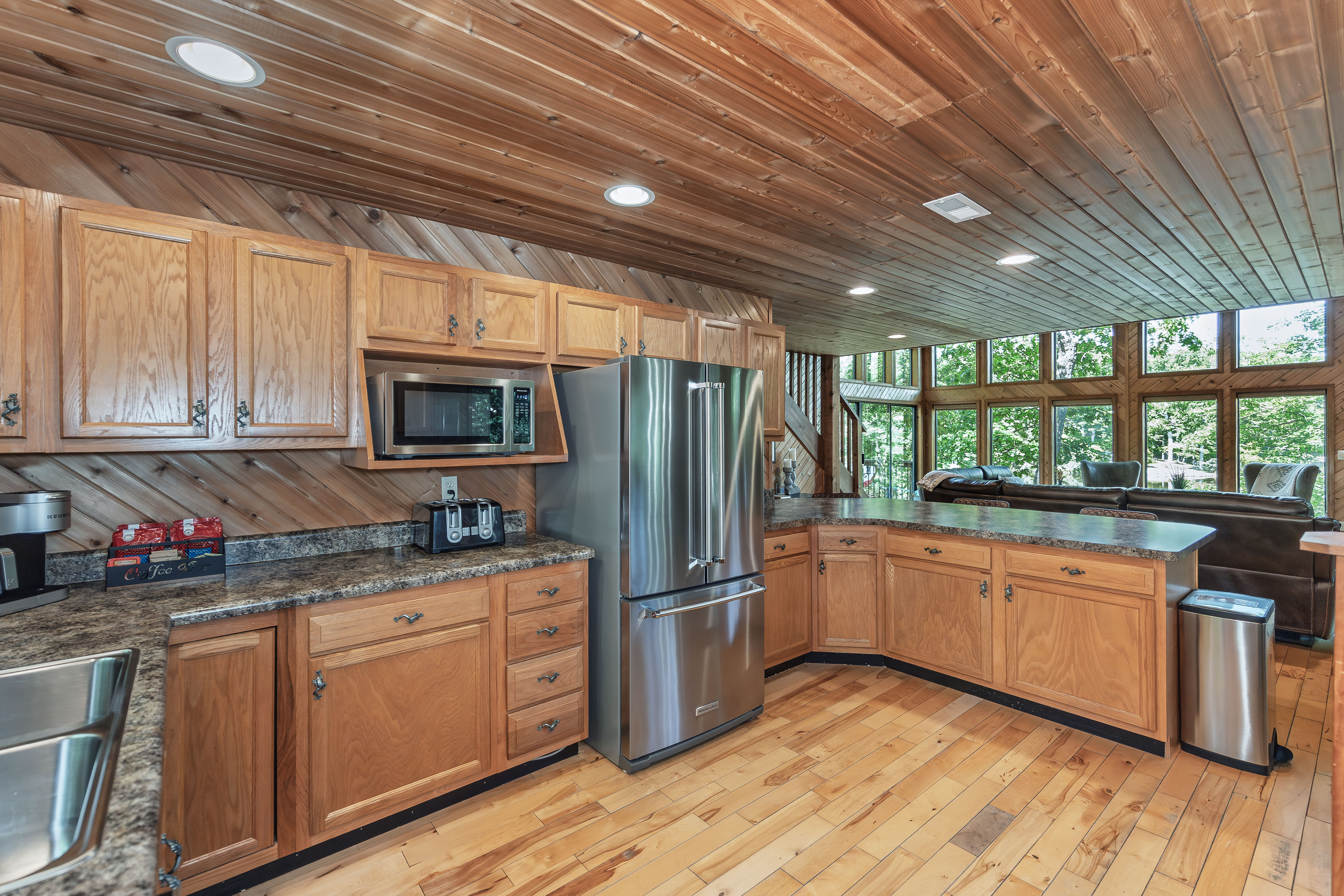 Stainless appliances, cookware, dishes, and cooking essentials included.
