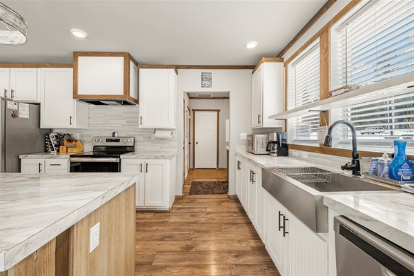 Kitchen and entry way in the background 