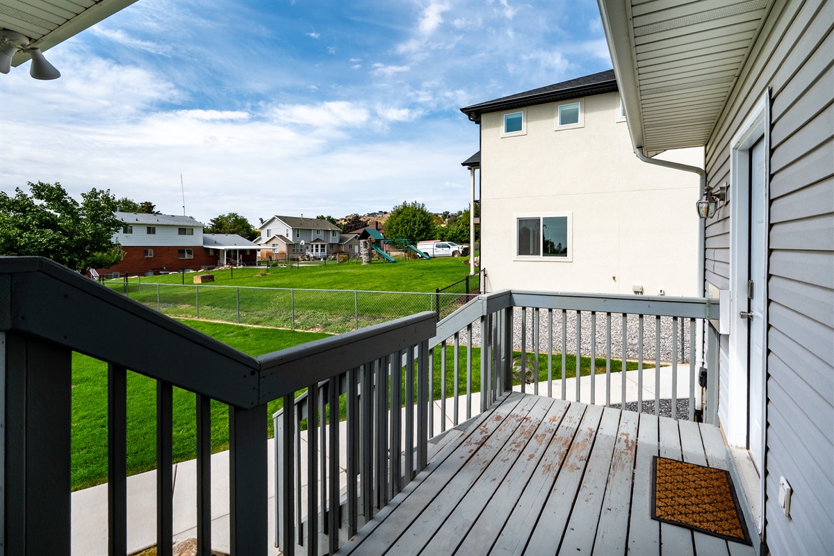 Deck provides access to the private studio entrance on the right.
