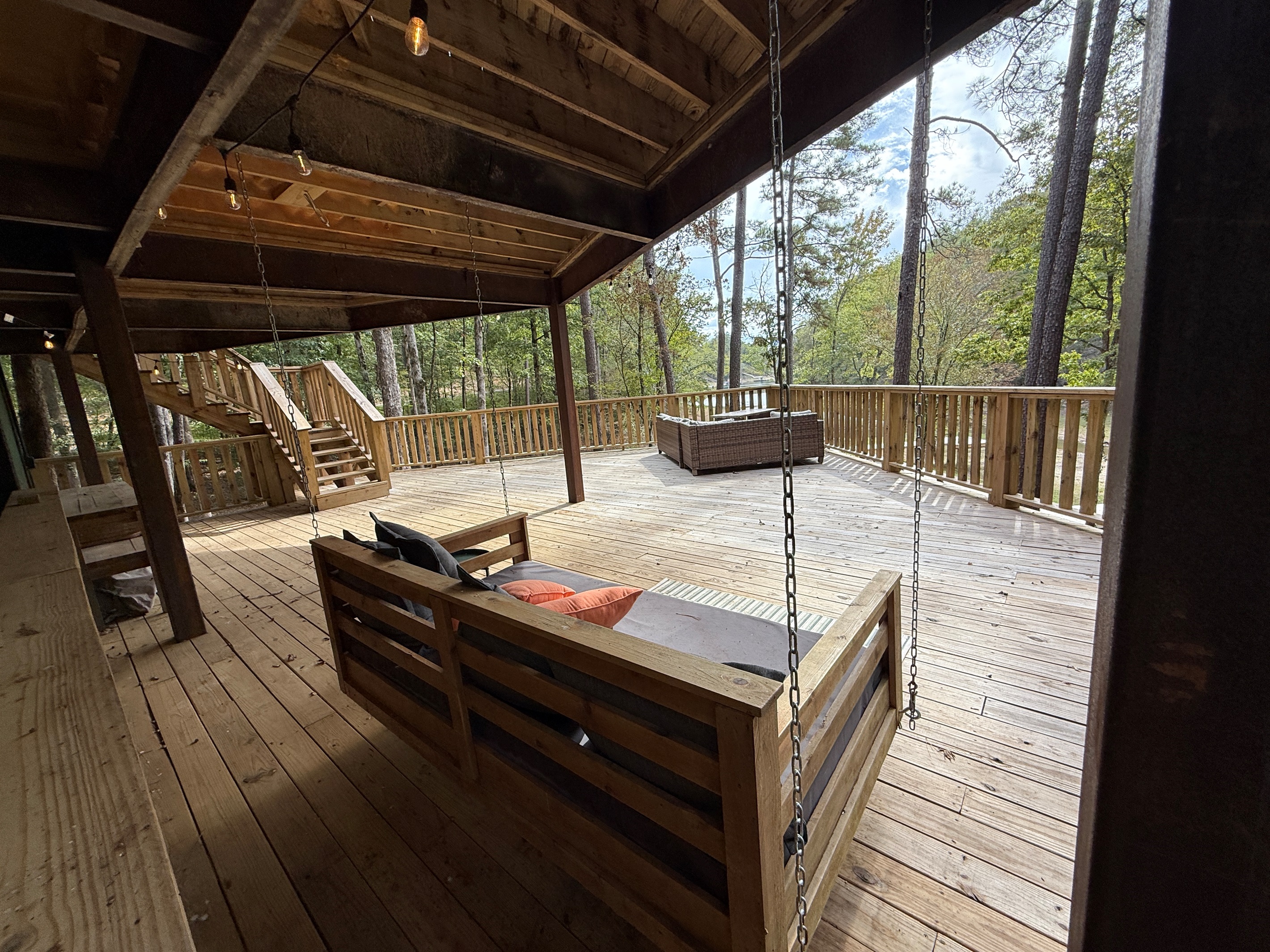 Massive lower deck for naps, hanging out, cornhole, reading, bird watching or just to be.