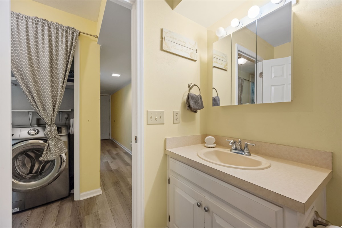 Convenient first floor bathroom with easy access and a nearby laundry area for longer stays