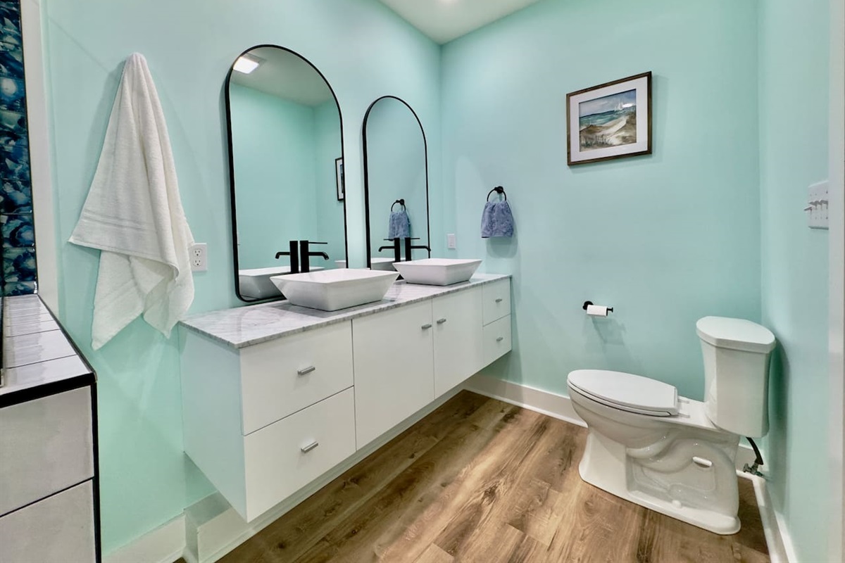 Welcome to our spacious bath with double vanities and style.