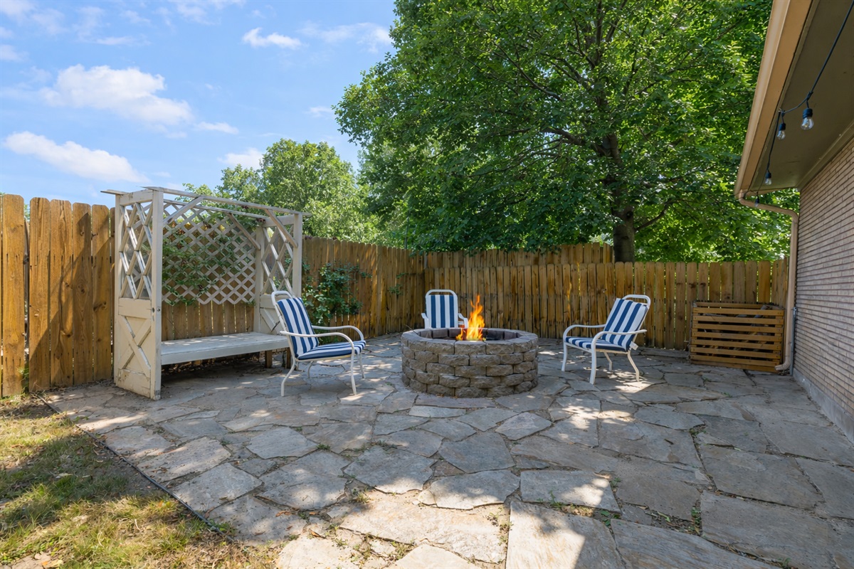 Enjoy a cozy fire in the backyard fire pit  and lose track of time staring into the fire chatting with loved ones.