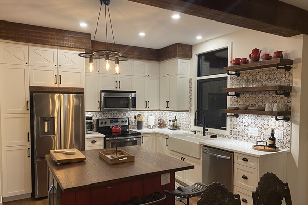 Handy kitchen island with seating next to dining area table