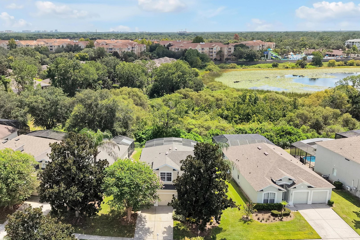 Motunui Villa Aerial: Motunui Villa’s peaceful Windsor Hills location, with conservation, Reedy Lake and the resort clubhouse and waterpark beyond.