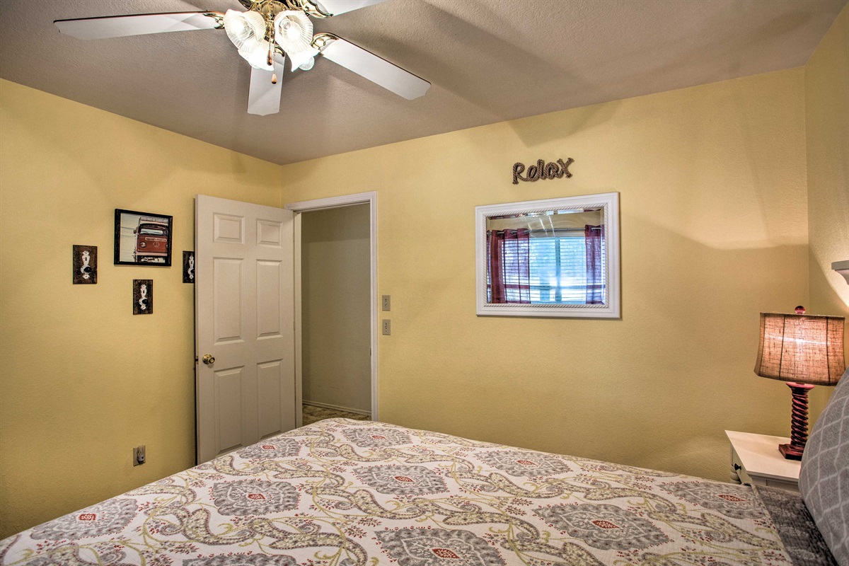 Yellow bedroom with queen size bed