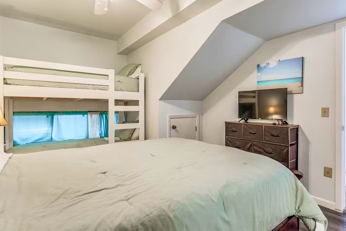 Another cozy bedroom setup provides a comfortable place to relax after a full day outside.